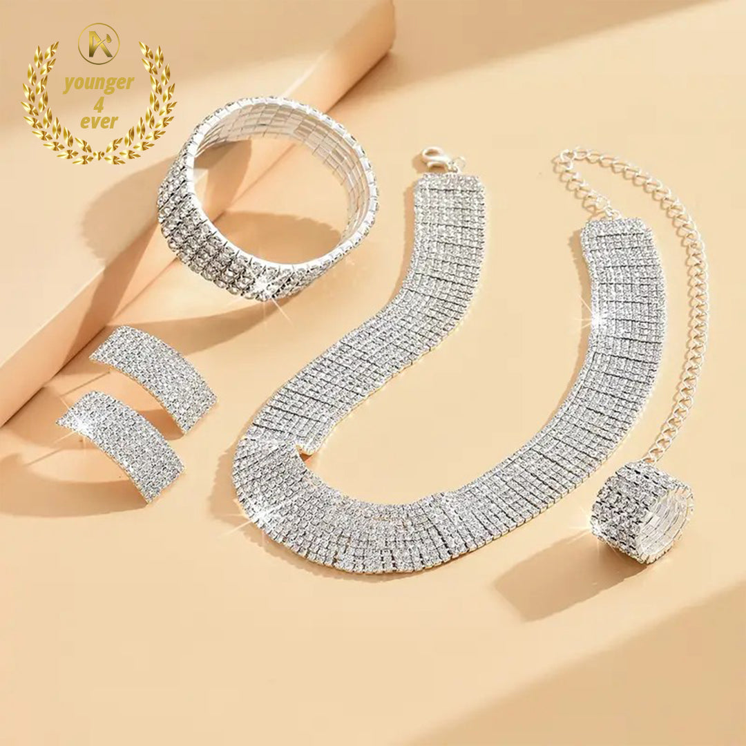 Pair of Earrings, 1 Necklace, 1 Bracelet, 1 Ring