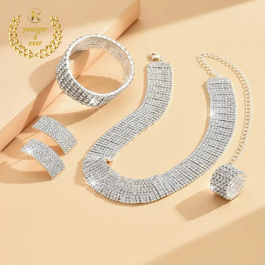 Pair of Earrings, 1 Necklace, 1 Bracelet, 1 Ring