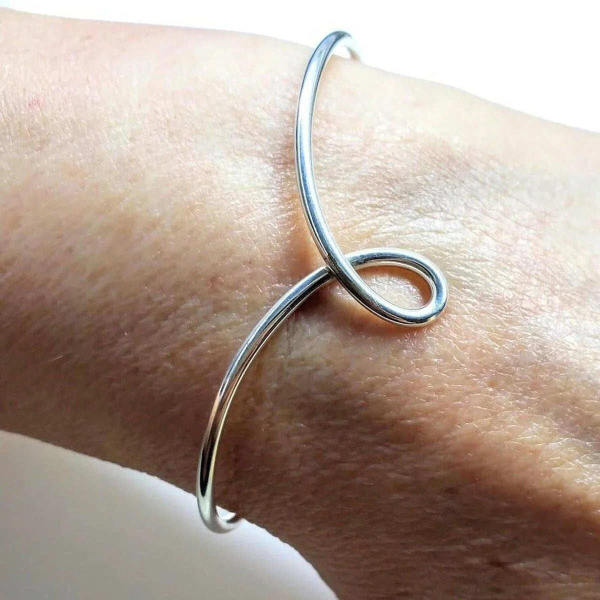 Everlasting Elegance Silver Dual-Sided Teardrop Tribute Bangle 