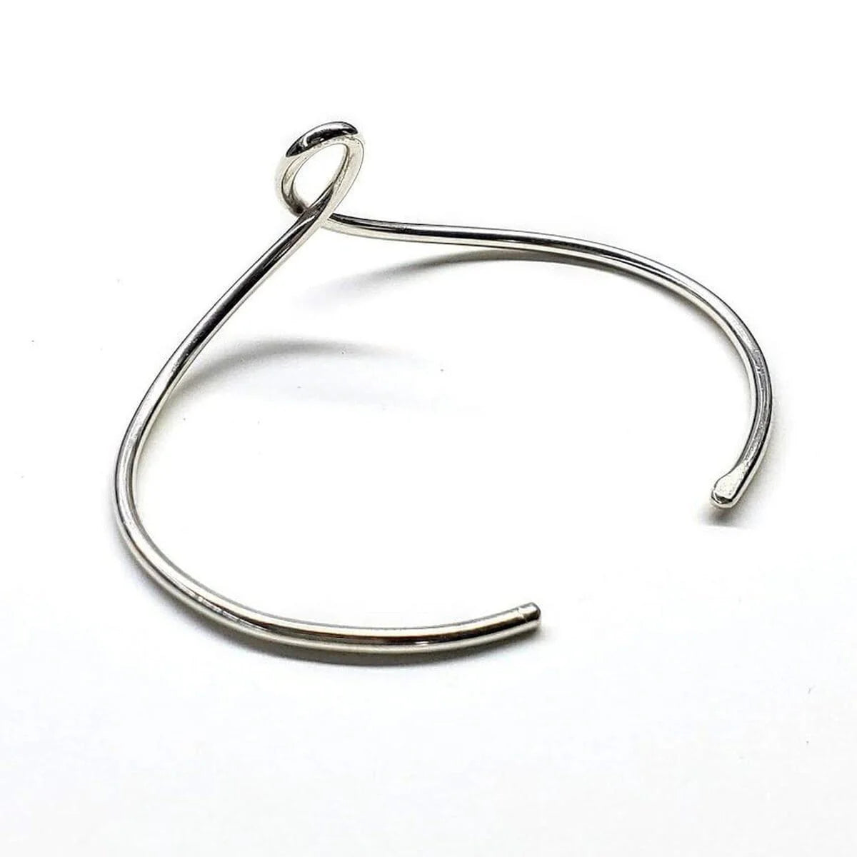 Everlasting Elegance Silver Dual-Sided Teardrop Tribute Bangle 