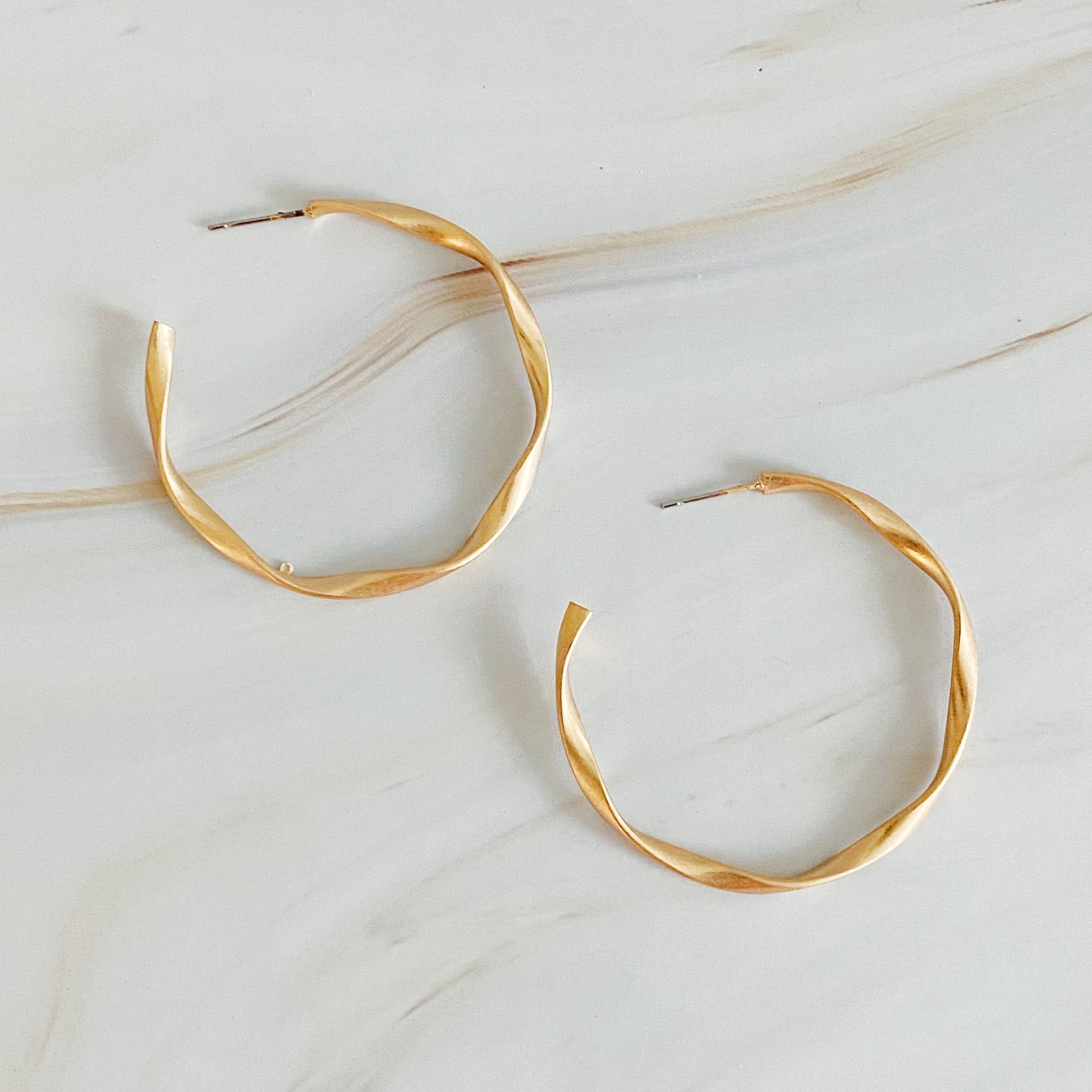 Gentle Wave Sleek Hoop Earrings